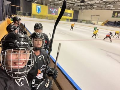 Coed Adult Hockey Team At A Tournament Made For Hockey Enthusiasts
